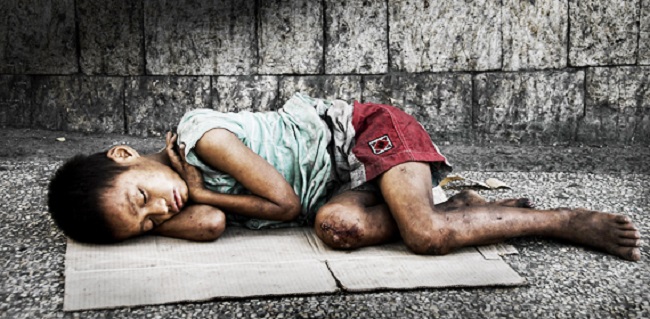 O INCONFORMISMO DE CORA CORALINA COM OS MENORES ABANDONADOS